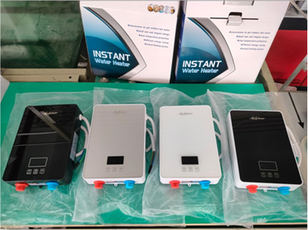 4 water heaters lying on a table